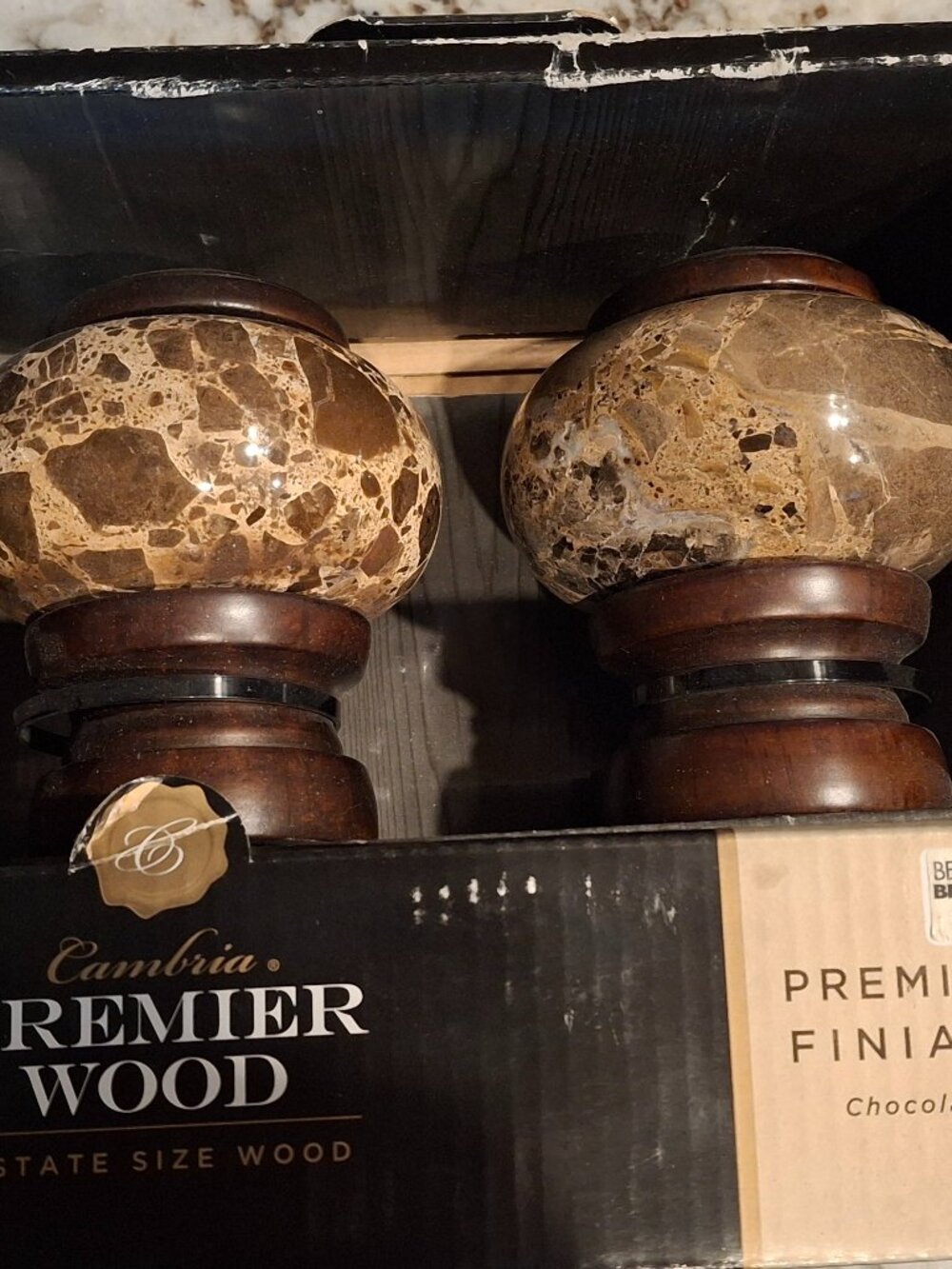 Cambria wood and granite curtain finials